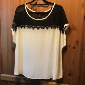 Torrid size 2 - Ivory with black lace shoulders.
